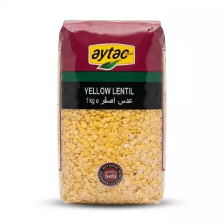 A professional e-commerce product photograph of a 1kg clear plastic pack of Aytac Yellow Lentils, featuring the branding, a 'Premium Quality' badge, and the 1kg e weight.