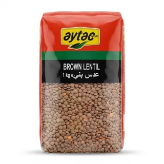 A professional 1:1 e-commerce product photograph of a 1kg bag of Aytac Brown Lentils, featuring red and clear plastic packaging, a black title band, and clear view of the dried lentils, isolated on a white background.