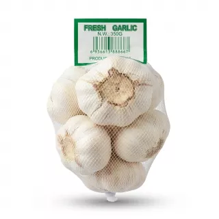 A 350g mesh bag filled with fresh garlic bulbs, as seen in a clean, professional studio photograph against a white background. The Bravo Fresh Garlic is neatly contained within the white mesh, and the green label featuring the barcode and net weight is prominently displayed at the top. The product is well-lit and in sharp focus.
