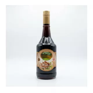 Enhanced Front view of Al Dayaa Tamarind Syrup 600ml bottle held in hand