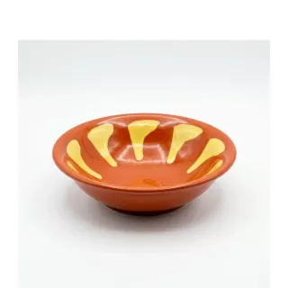 Enhanced Phoenix 5 inch Arab Bowl with orange and yellow hand-painted design on countertop