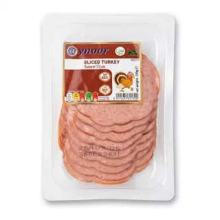 Enhanced Front of Aynoor Sliced Turkey Salami Style 130g pack in hand in a supermarket
