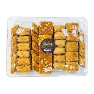 Tray of assorted Al Sultan mixed baklava pastries in clear packaging