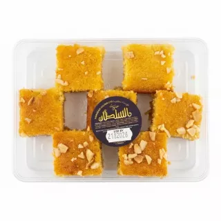 Pack of Sultan Basbousa semolina cake slices with nuts, sealed in a plastic container