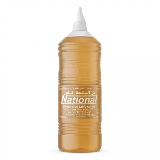 Front of National Table Vinegar Coloured 50cl bottle held in hand