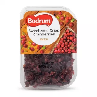 Front view of Bodrum Sweetened Dried Cranberries 200g pack held in hand
