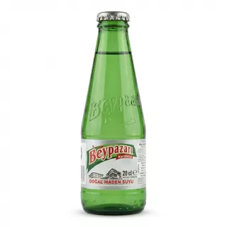 Front view of Beypazari Karakoca Dogal Maden Suyu 20cl glass bottle held in hand