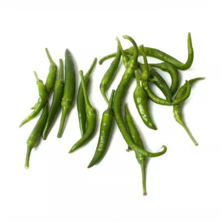 Add a fiery kick to your dishes with Fresh Indian Chillies. This 500g pack offers a variety of green and red chillies, perfect for adding a spicy touch to your cooking. Available at halalo.co.uk