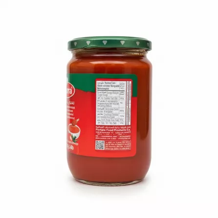 Back view of Durra tomato paste jar with nutrition facts and production info