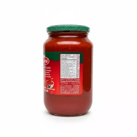 Side view of Durra tomato paste jar displaying nutritional facts