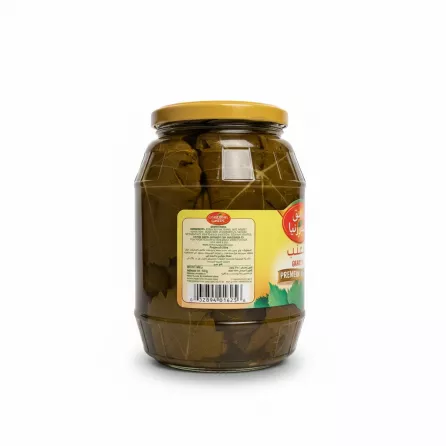 Back label with ingredients and barcode on jar of grape leaves