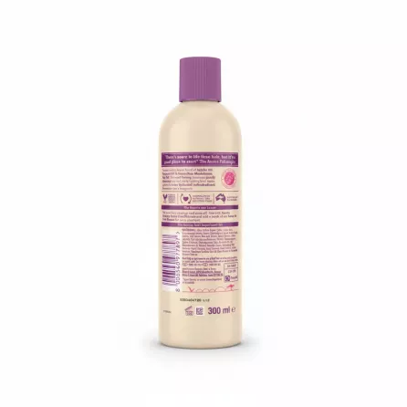 Back view of Aussie Bouncy Curls Shampoo bottle showing ingredients and usage