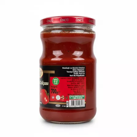 Back label of Öncü tomato paste jar showing product details