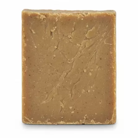 Back view of square natural olive oil soap showing texture