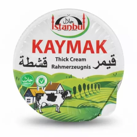Istanbul Kaymak thick cream container top label with cow and green field illustration