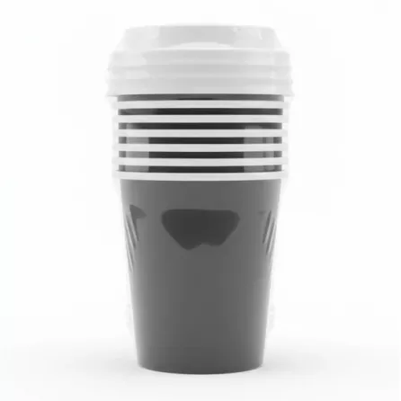 Close-up of stacked paper cups with lids in packaging