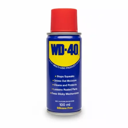 WD-40 multi-use lubricant spray can with red cap held in hand