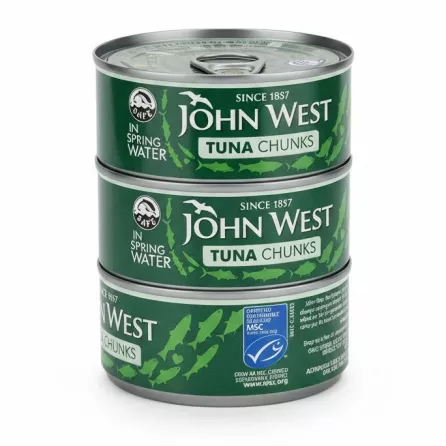 Side view of four stacked John West Tuna Chunks cans