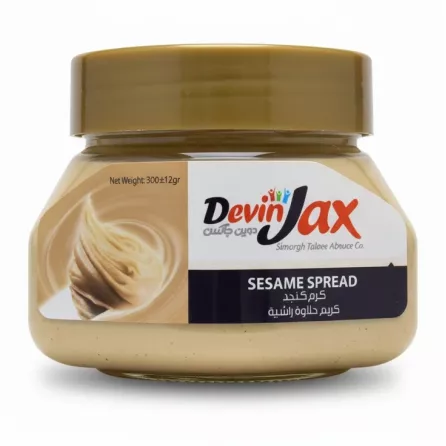 Jar of DevinJax Sesame Spread with golden lid and beige creamy contents inside