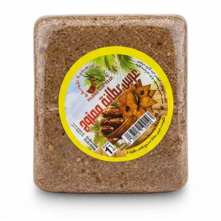 Block of Algerian date paste wrapped in clear plastic with label