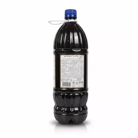 Back side of Donya Pomegranate Juice bottle with nutritional information and expiry date