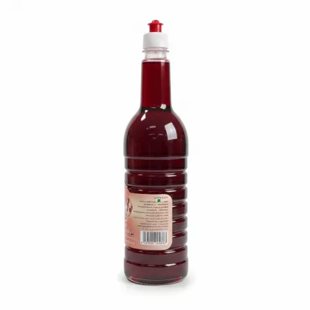 Back view showing the barcode and product details on Krebial pomegranate syrup bottle