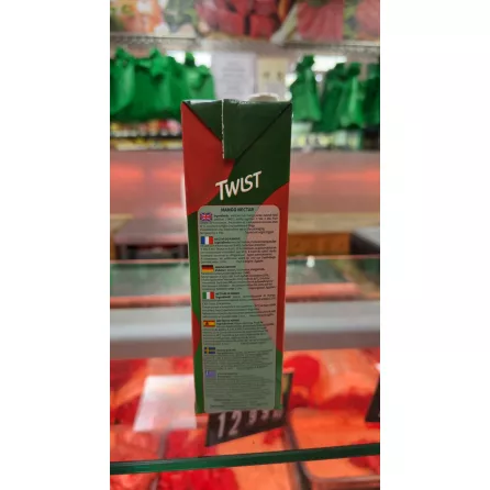 Side view with ingredient details of Twist Mango Nectar