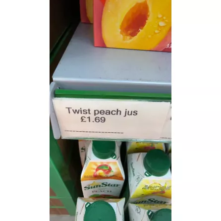 Price label showing Twist Peach Juice priced at £1.69