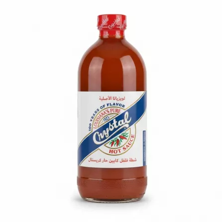 Front label of Crystal Hot Sauce bottle showing brand and hot pepper design