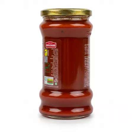 Back of Khoushab tomato paste jar with product information in multiple languages