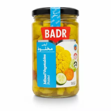 Glass jar of Badr mixed pickled vegetables showing cauliflower, cucumber, and carrot pieces