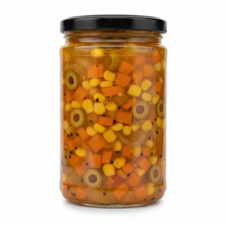 Close-up side view of Badr Spanish Pickled vegetables jar showing contents