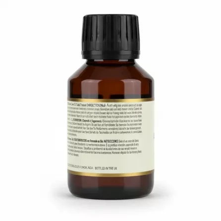 Back view of Pure World Castor Oil bottle with directions and caution text