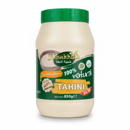 Alnakhla Tahini plastic jar with green lid and label displaying 100% natural sesame seed contents