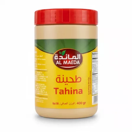 Jar of Al Maeda Tahina Sesame Paste with red lid