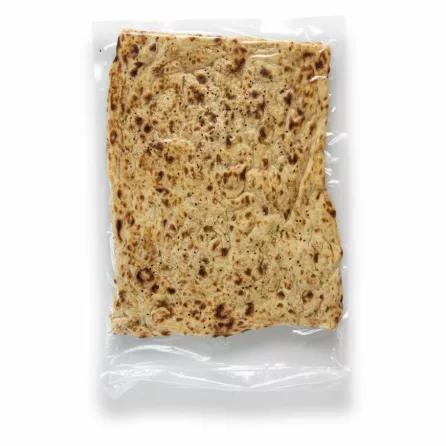 Vacuum-sealed rectangular Persian Sangak flatbread sprinkled with sesame seeds