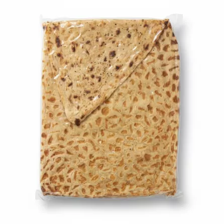 Vacuum-sealed rectangular Sangak flatbread showing textured patterned surface