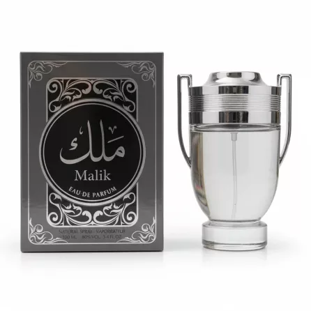 Close up of Malik Eau De Parfum bottle and packaging on black surface