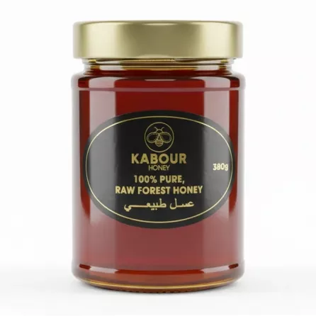 Jar of Kabour 100% Pure Raw Forest Honey with gold lid and black label