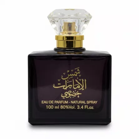 Dark glass bottle of Shams Al Emarat Khususi fragrance with crystal cap