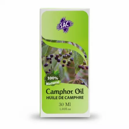 Hand holding SAC Camphor Oil 30ml packaging with 100% natural label and camphor plant illustration