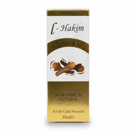 L-Hakim Clove Oil 30ml packaging held in hand showing front