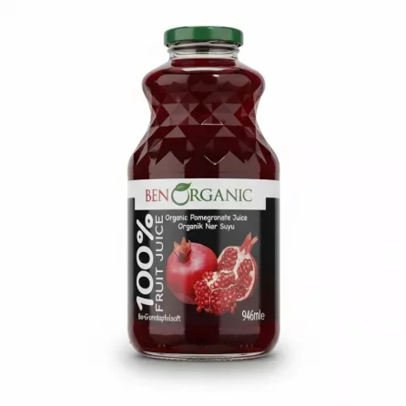 Glass bottle filled with dark red pomegranate juice with front label showing pomegranate image