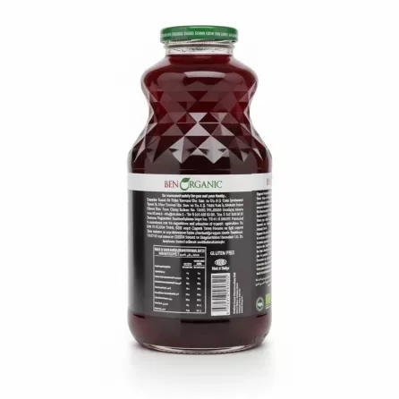 Back view of textured glass bottle with nutritional facts and certification labels