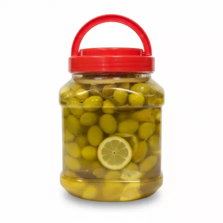 Jar of pickled green olives with lemon slices and red lid