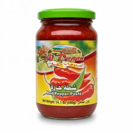 Jar of Al Dayaa Red Pepper Paste with green lid showing label and red peppers