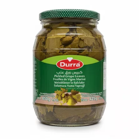 Jar of Durra branded pickled grape leaves with green polka dot lid