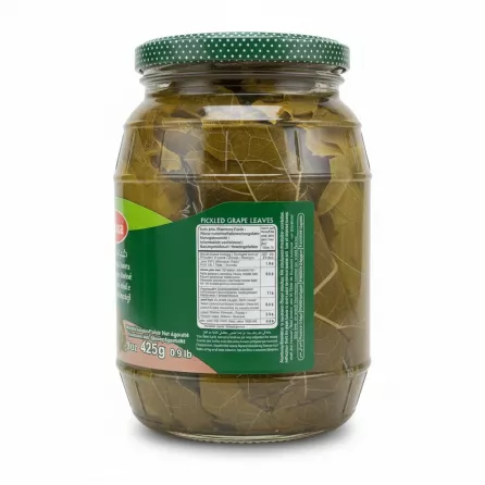 Close-up of pickled grape leaves jar nutrition and usage label