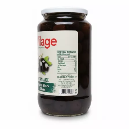 Nutritional information and barcode on jar of Village extra large pitted black olives