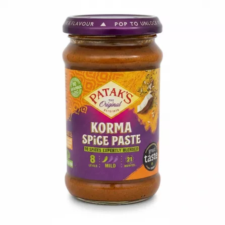 Glass jar of Patak's Korma Spice Paste with purple and orange label